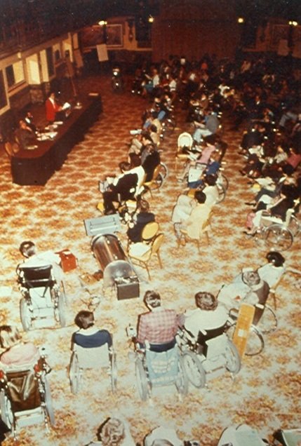 symposium audience color photograph disability history america